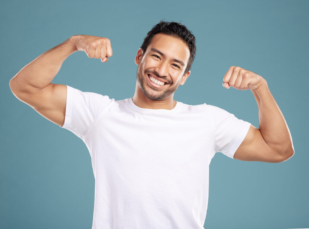handsome young mixed race man flexing his biceps w 2025 04 06 11 11 09 utc